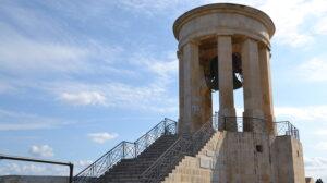 Seige bell memorial, a small structure with a bell inside and steps leading up to it